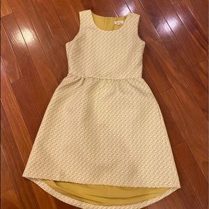 White dress with accents of yellow